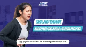 Wanita memegang perut karena sakit, ilustrasi gejala cacingan yang sering tidak disadari. Edukasi kesehatan tentang pencegahan dan tanda-tanda cacingan.
